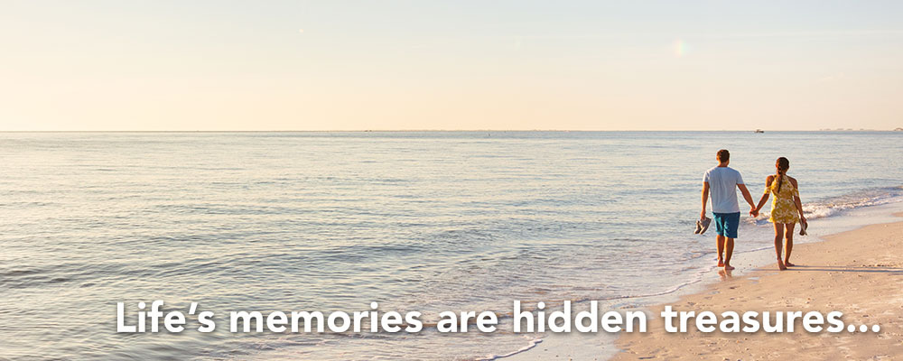 Couple walking on the beach with text – Life's memories are hidden treasures...